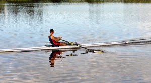 cardio exercise for men rowing in water